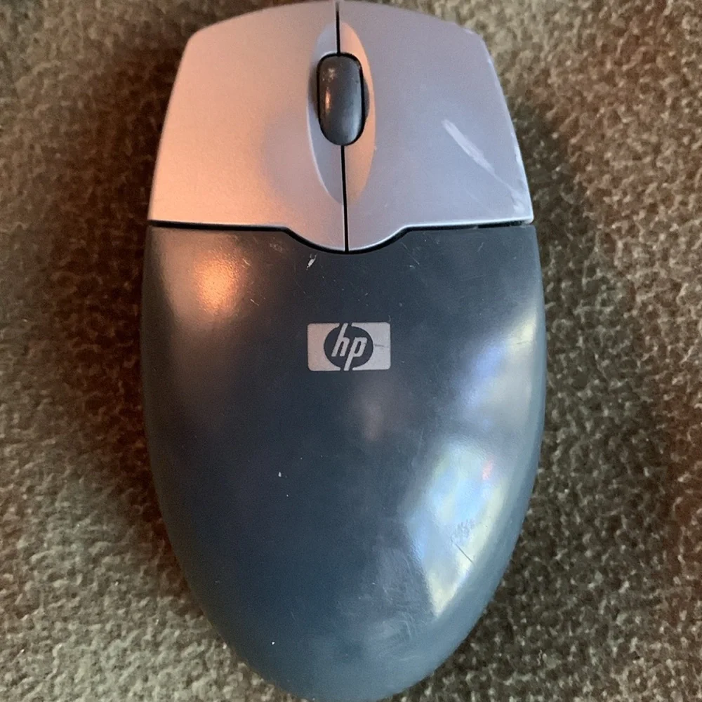 HP computer mouse with cord.